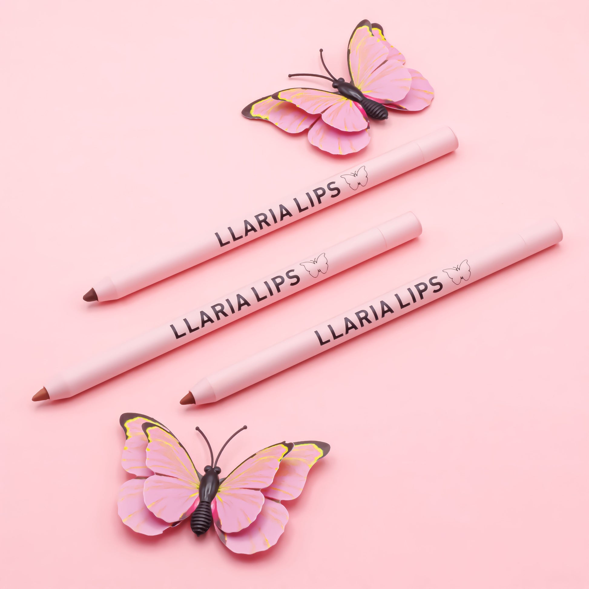 trio of lip liner with butterflies.