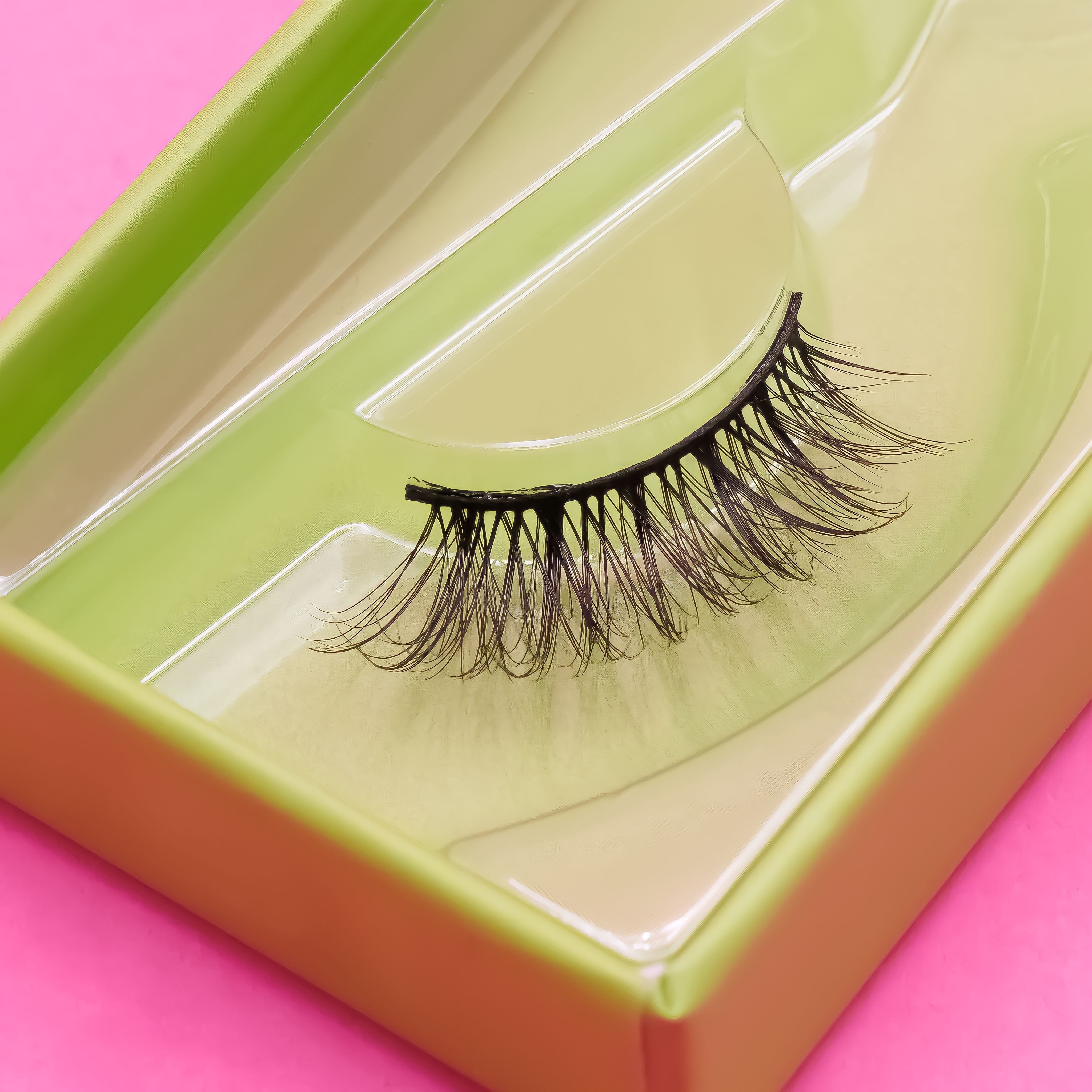 wispy and long cat eye half lash faux mink false eyelashes in lime green lash box.